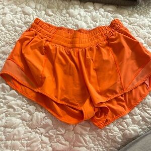 lululemon shorts orange size 6 2.5 inch worn a few times perfect condition